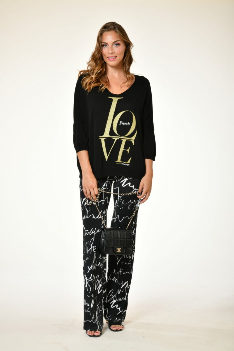 Pull famous - French love - noir . Pantalon st tropez casa amor . collection prêt à porter printemps 2024 au soleil st tropez