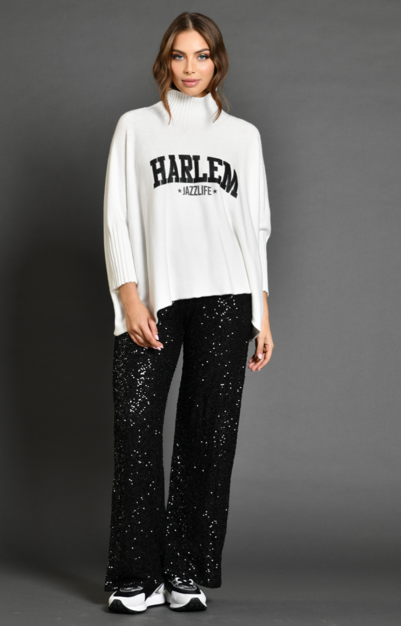 Pull Aristo Harlem col roulé blanc et Pantalon costume POP noir paillettes